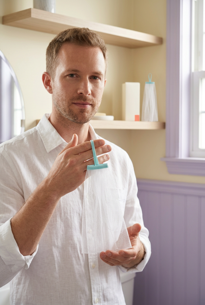 Adult male model holding an aqua-loop white foaming net
